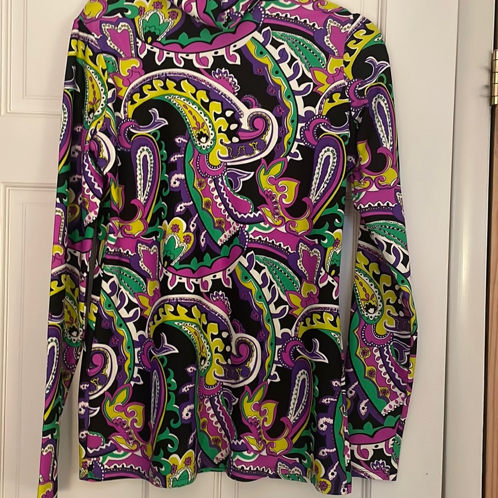 Very colorful turtleneck .